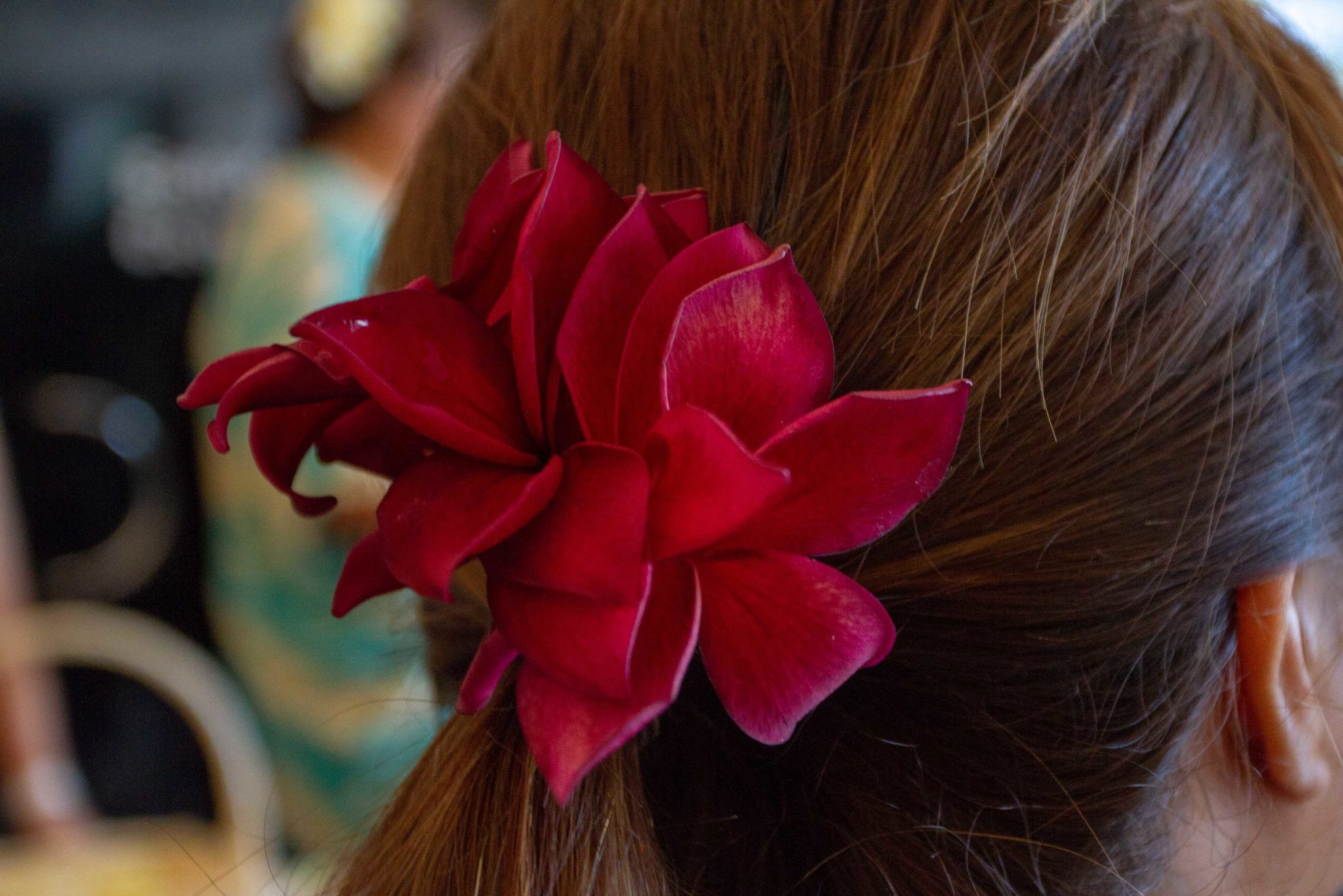 Polynesian Connection member celebrating May Day with flower in hair