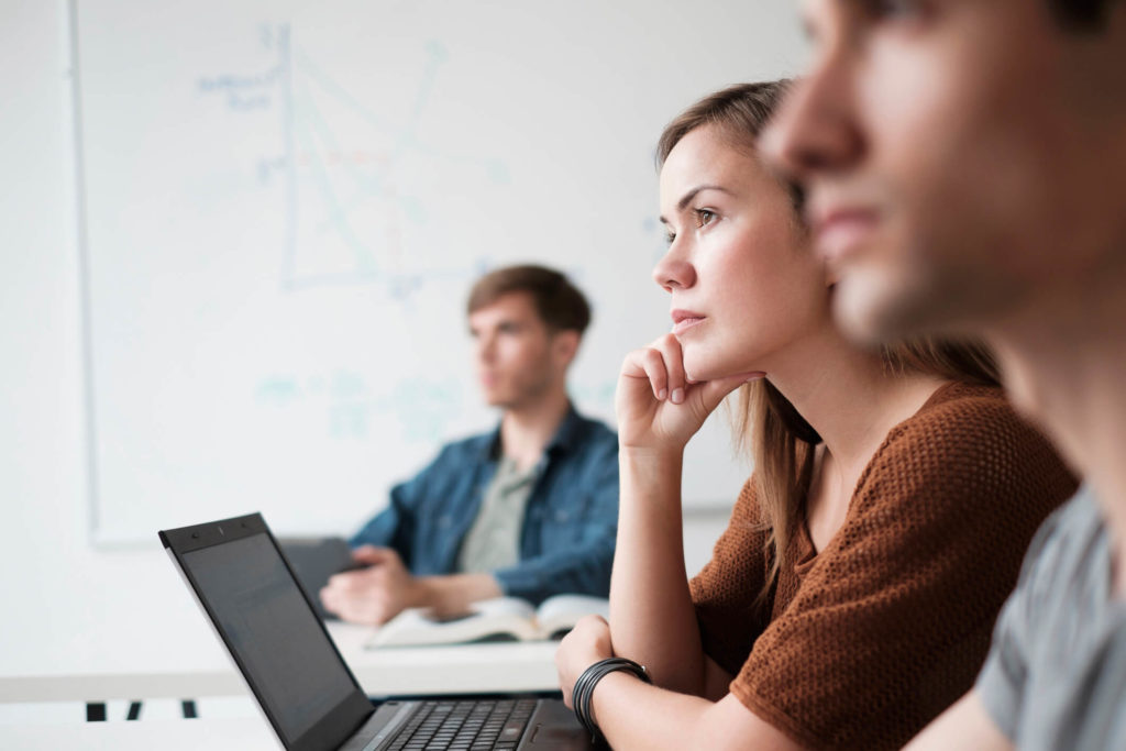 woman on laptop in information security training